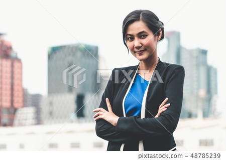 Portrait of young confident Asian businesswoman. Portrait of young confident Asian businesswoman. 48785239