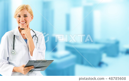 Woman doctor working at the hospital office. Woman doctor working at the hospital office. 48785608