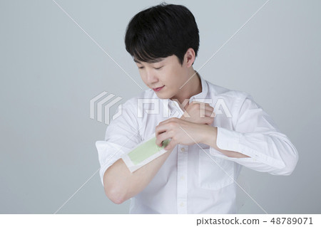 Portrait of attractive young man isolated on gray background 072 Portrait of attractive young man isolated on gray background 072 48789071