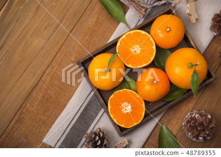 Collections of fresh Tangerines. tangerine slices, juice with leaves. Fruit composition. 076 48789355