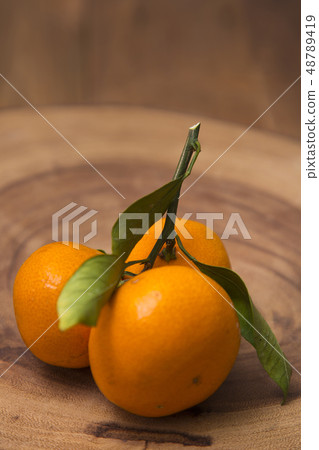 Collections of fresh Tangerines. tangerine slices, juice with leaves. Fruit composition. 031 48789419