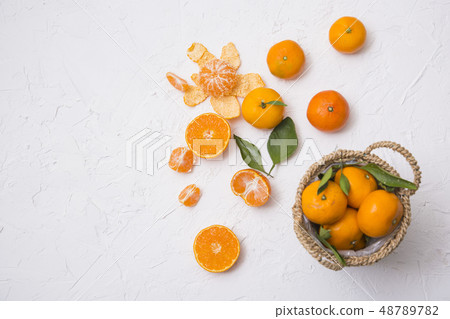 Collections of fresh Tangerines. tangerine slices, juice with leaves. Fruit composition. 056 Collections of fresh Tangerines. tangerine slices, juice with leaves. Fruit composition. 056 48789782