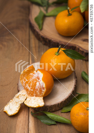 Collections of fresh Tangerines. tangerine slices, juice with leaves. Fruit composition. 060 48789786
