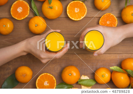 Collections of fresh Tangerines. tangerine slices, juice with leaves. Fruit composition. 081 Collections of fresh Tangerines. tangerine slices, juice with leaves. Fruit composition. 081 48789828