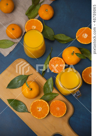 Collections of fresh Tangerines. tangerine slices, juice with leaves. Fruit composition. 035 48789865