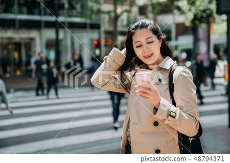 businesswoman texting message onine 48794371