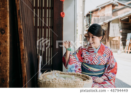 happy japanese woman find childhood memory happy japanese woman find childhood memory 48794449