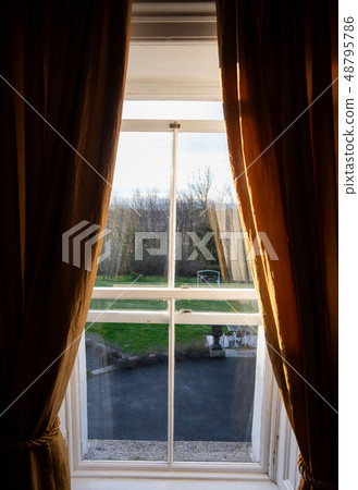 Window at the garden. 48795786