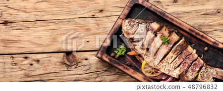 Carp stuffed with vegetables 48796832