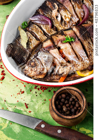 Carp stuffed with vegetables 48796833