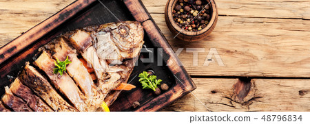 Carp stuffed with vegetables 48796834