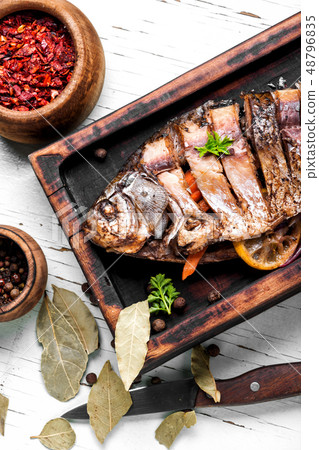 Carp stuffed with vegetables 48796835