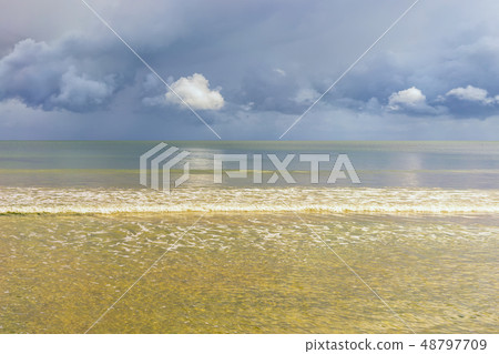 Clouds over the sea before a thunderstorm Clouds over the sea before a thunderstorm 48797709
