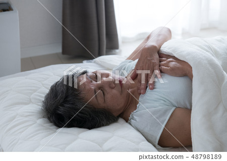 Poor senior woman suffering pain Poor senior woman suffering pain 48798189
