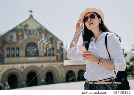asian girl standing on front ground of church asian girl standing on front ground of church 48798321