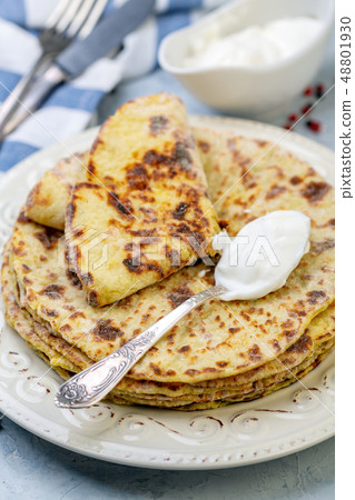 Potato pancakes lefse. Norwegian cuisine. Potato pancakes lefse. Norwegian cuisine. 48801930