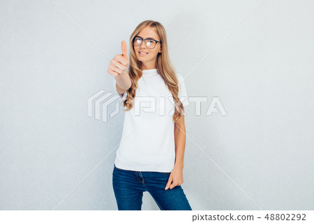 young girl with glasses, wearing white t-shirt 48802292