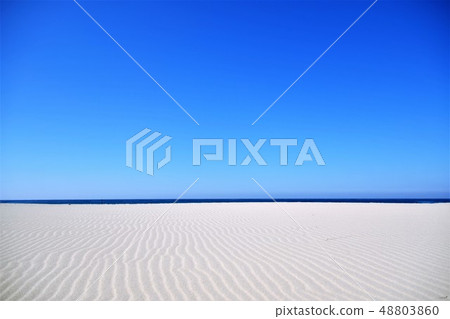 Blue sky and sandy beach Blue sky and sandy beach 48803860