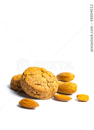 Integral cookies with almonds isolated on white Integral cookies with almonds isolated on white 48804012