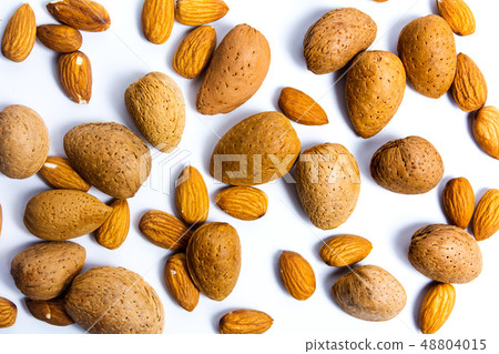Fresh almonds on white flat lay Fresh almonds on white flat lay 48804015