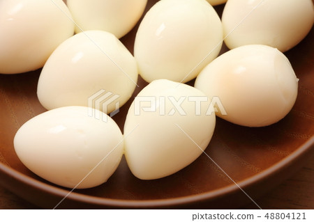 Quail egg. The shell is peeled off after boiling. 48804121