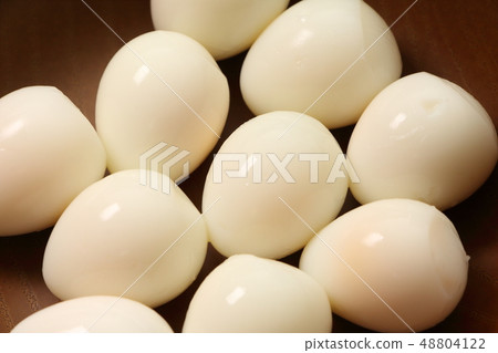 Quail egg. The shell is peeled off after boiling. 48804122