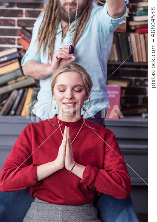 Delighted nice woman feeling a stream of energy 48804538