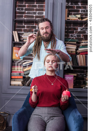 Nice young woman holding special magic items 48804605