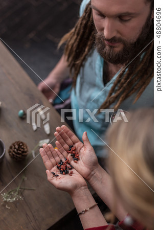 Top view of female hands with special seeds in them 48804696