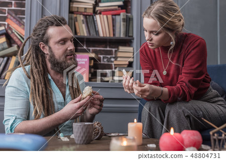 Nice good looking woman holding a crystal 48804731