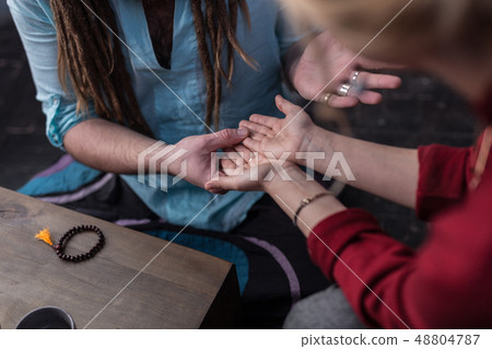 Top view of a nice young woman showing her palms 48804787