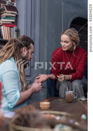 Nice positive young woman giving her hand 48804829