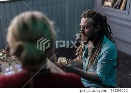 Nice bearded man focusing on his work 48804952