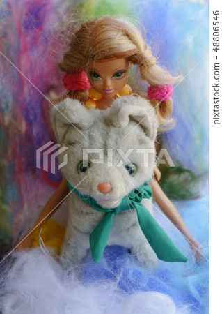 Blonde doll-teenager with dog miniature 48806546