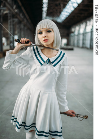 Pretty anime style blonde lady with sword Pretty anime style blonde lady with sword 48807491