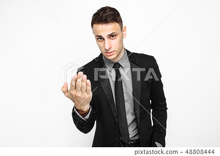 An excited business man in a black suit  48808444