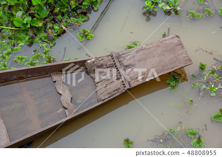 Top view the prow of wooden boat as it floats on Top view the prow of wooden boat as it floats on 48808955