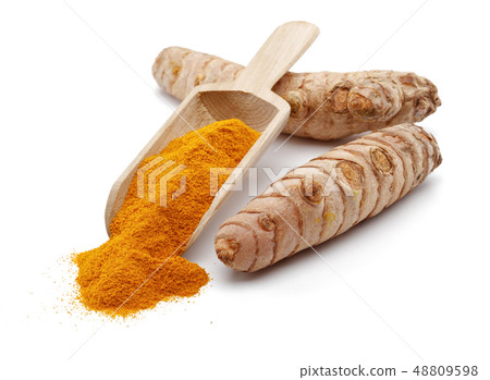 Fresh turmeric with slices and curcuma in wooden 48809598