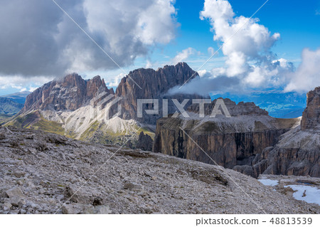 The Sass Pordoi is a relief of the Dolomites, in the Sella group, Italy The Sass Pordoi is a relief of the Dolomites, in the Sella group, Italy 48813539