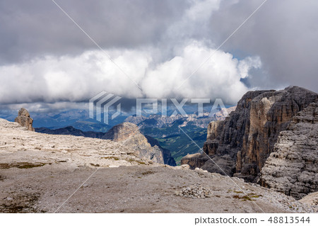 The Sass Pordoi is a relief of the Dolomites, in the Sella group, Italy The Sass Pordoi is a relief of the Dolomites, in the Sella group, Italy 48813544