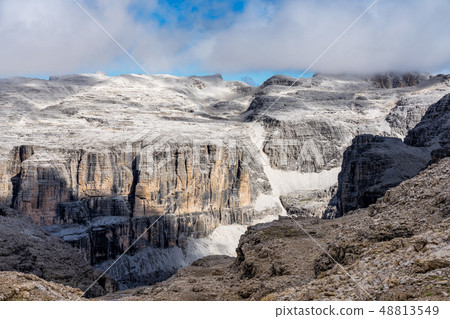 The Sass Pordoi is a relief of the Dolomites, in the Sella group, Italy The Sass Pordoi is a relief of the Dolomites, in the Sella group, Italy 48813549