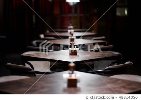 Bar or cafe tables with napkin pepper floss. 48814050