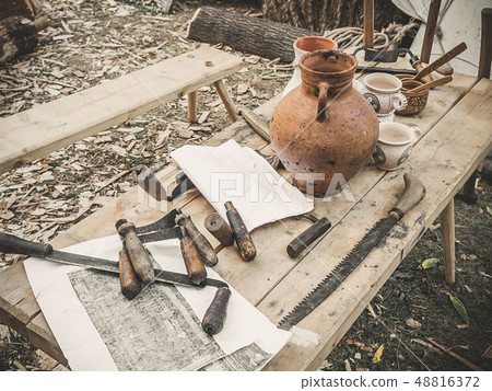 Old woodworking hand tool drawknife, drawshave, drawing knife, shaving knifewooden in a carpentry 48816372