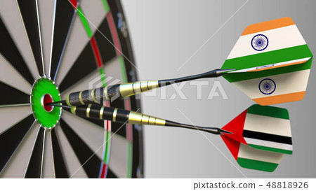 Flags of India and the UAE on darts hitting bullseye of the target. International cooperation or Flags of India and the UAE on darts hitting bullseye of the target. International cooperation or 48818926