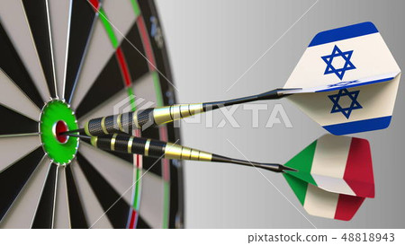 Flags of Israel and Italy on darts hitting bullseye of the target. International cooperation or 48818943
