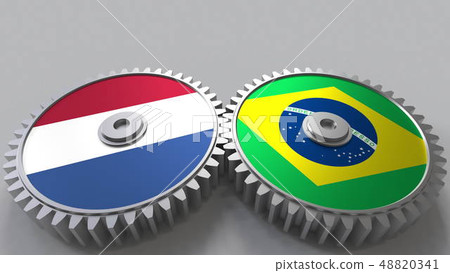 Flags of the Netherlands and Brazil on meshing gears. International cooperation conceptual 3D Flags of the Netherlands and Brazil on meshing gears. International cooperation conceptual 3D 48820341