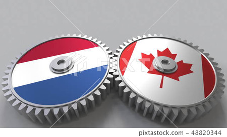 Flags of the Netherlands and Canada on meshing gears. International cooperation conceptual 3D Flags of the Netherlands and Canada on meshing gears. International cooperation conceptual 3D 48820344