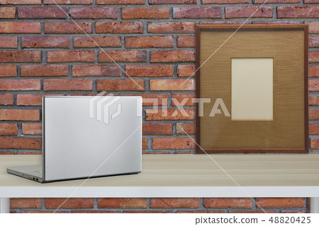 Computer with black screen on office table Computer with black screen on office table 48820425