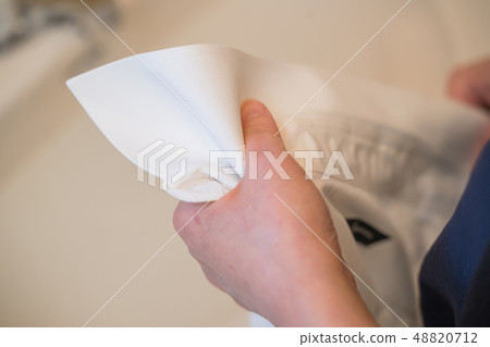 Laundry, shirt stain removal Laundry, shirt stain removal 48820712