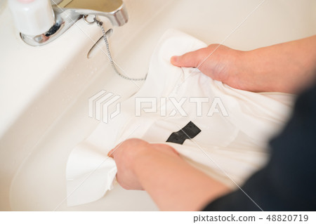 Laundry, shirt stain removal 48820719